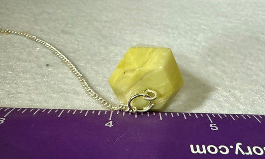 Beautiful Serpentine Pendulum is  1.5” and with chain is 8.5”