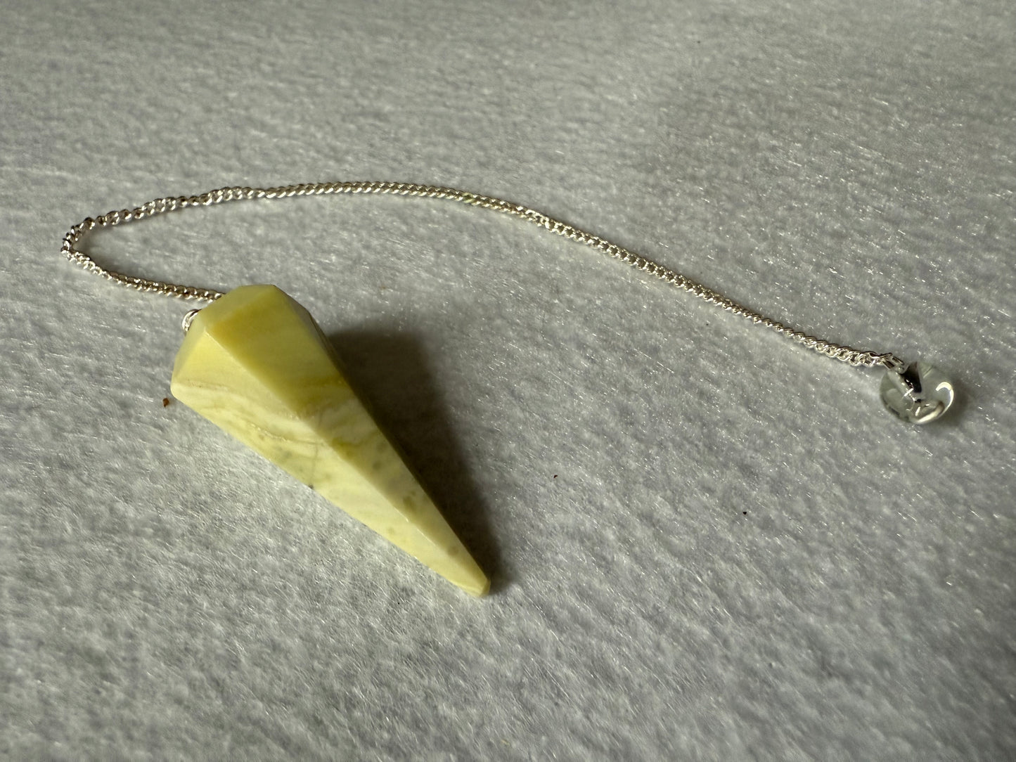 Awesome Serpentine Pendulum is  1.5” and with chain is 8.5”