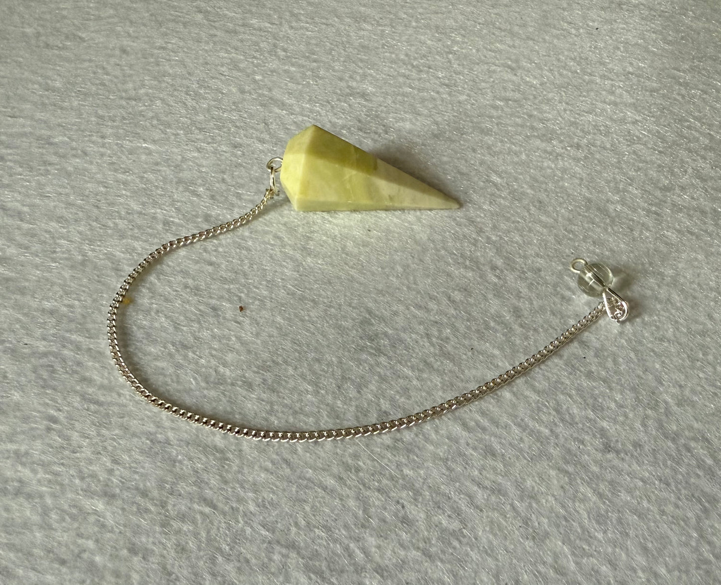 Beautiful Serpentine Pendulum is  1.5” and with chain is 8.75”
