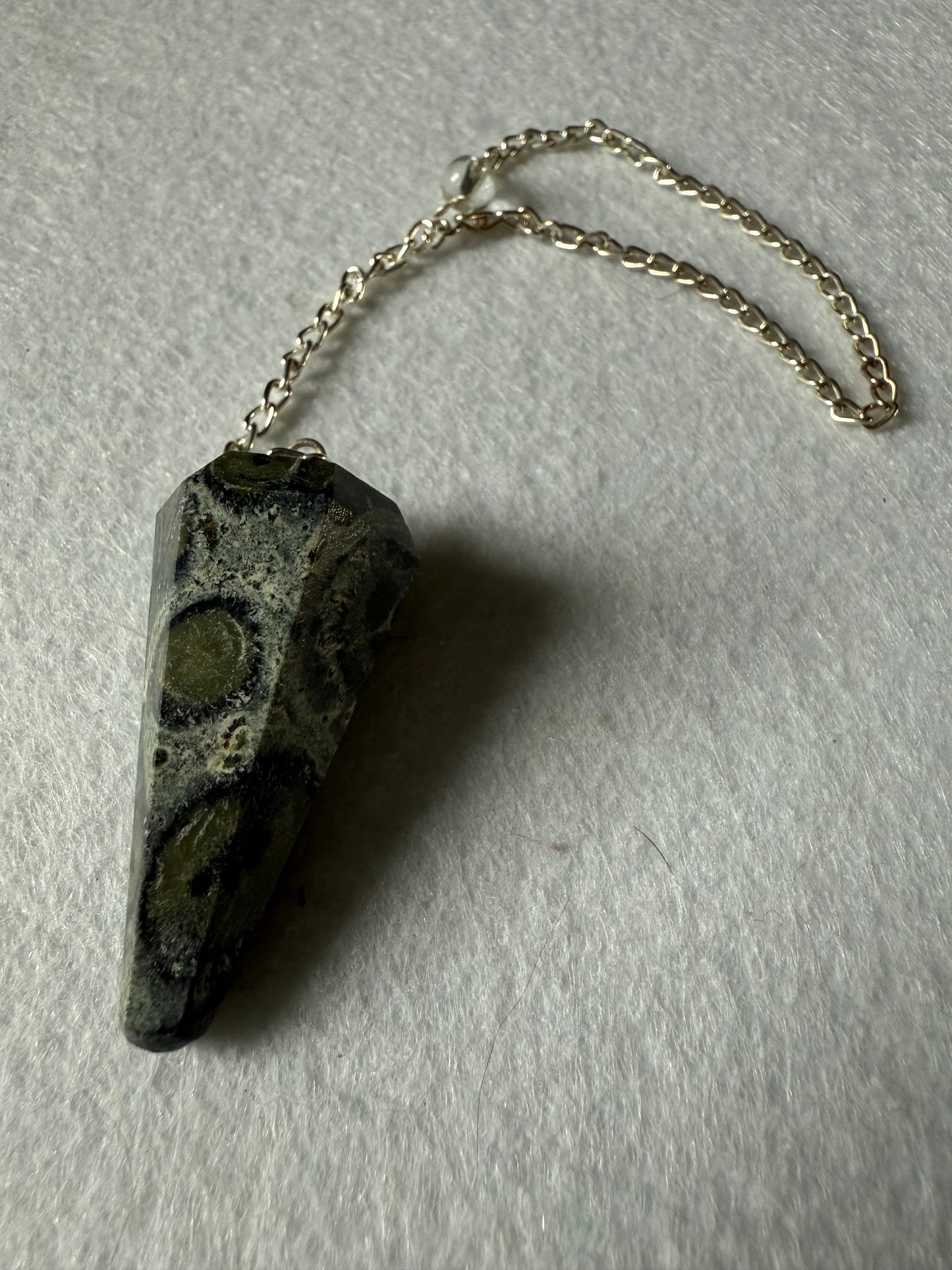 Awesome Kambaba Jasper Pendulum is  1.5” with chain is 9.75”