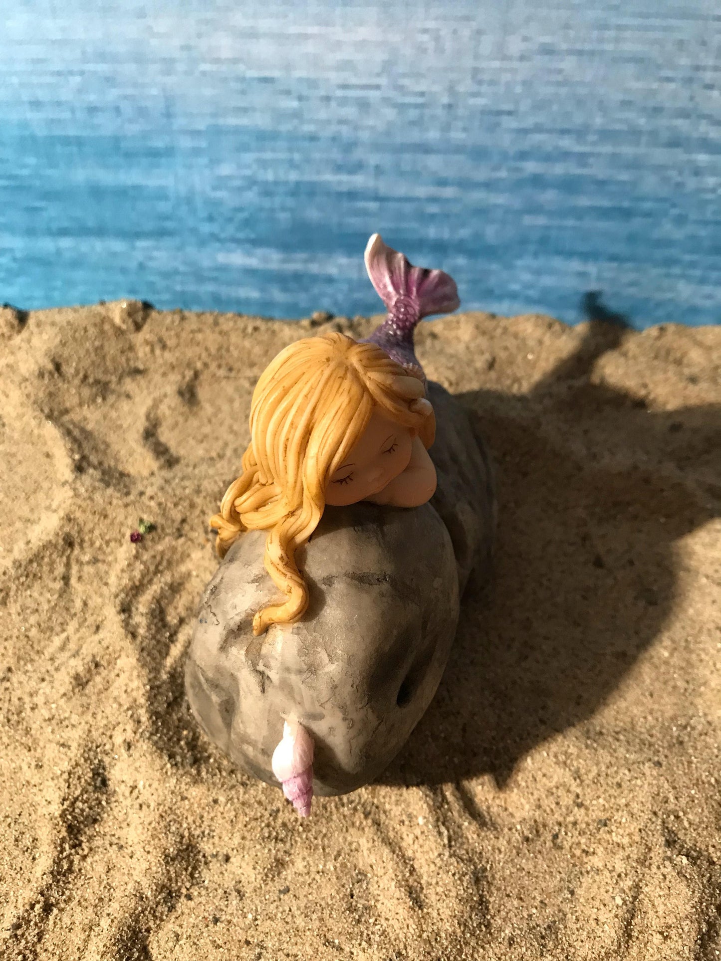 Pretty fairy beach garden mermaid with blonde hair. Miniature mermaid. Beach theme fairy garden.