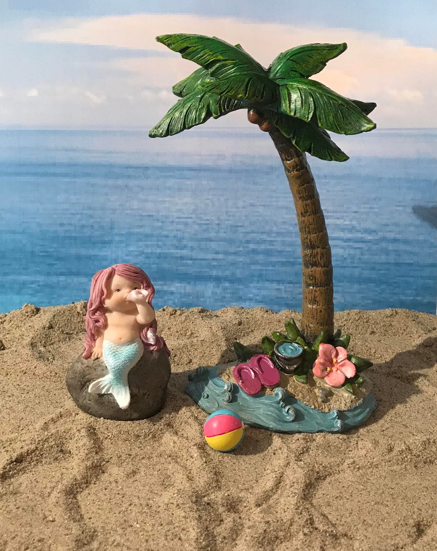 Adorable mermaid blowing a seashell. mermaid playing with a shell to make music, beach miniatures, nautical miniatures, fairy garden beach