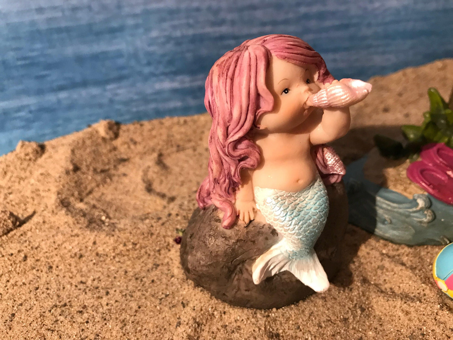 Adorable mermaid blowing a seashell. mermaid playing with a shell to make music, beach miniatures, nautical miniatures, fairy garden beach
