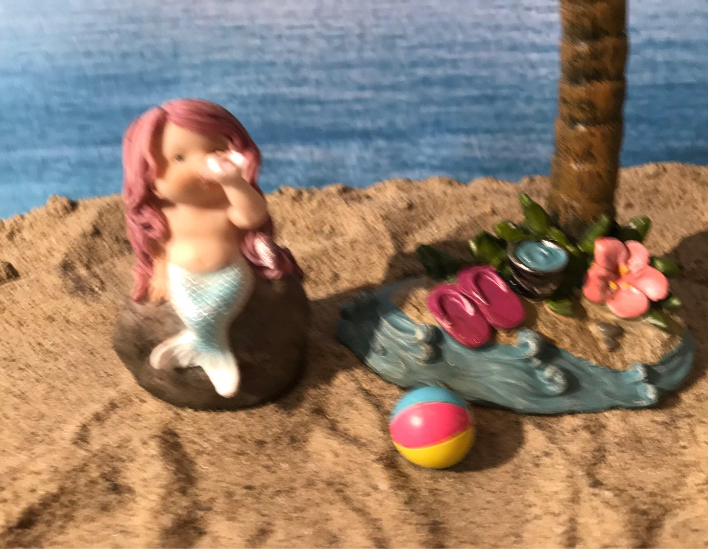 Adorable mermaid blowing a seashell. mermaid playing with a shell to make music, beach miniatures, nautical miniatures, fairy garden beach