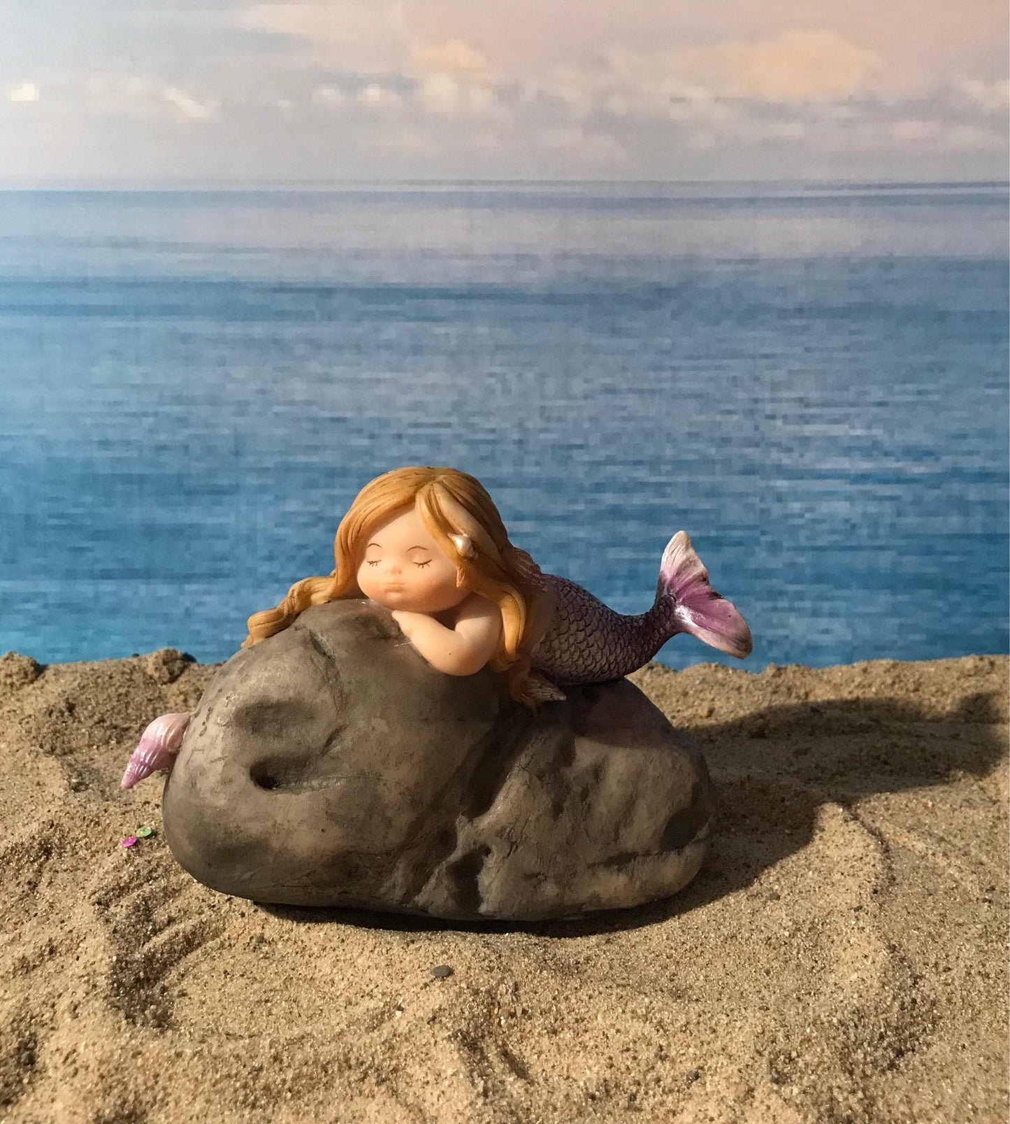 Pretty fairy beach garden mermaid with blonde hair. Miniature mermaid. Beach theme fairy garden.