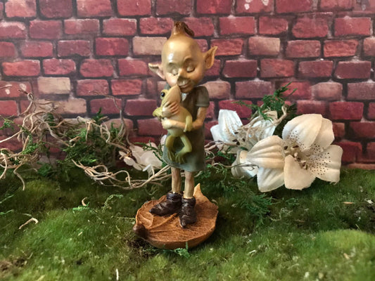 Pixie lovers garden pixie and baby dragon, pixie laying on tummy in thought, pixie gardening with shovel and bucket and owl sitting on head