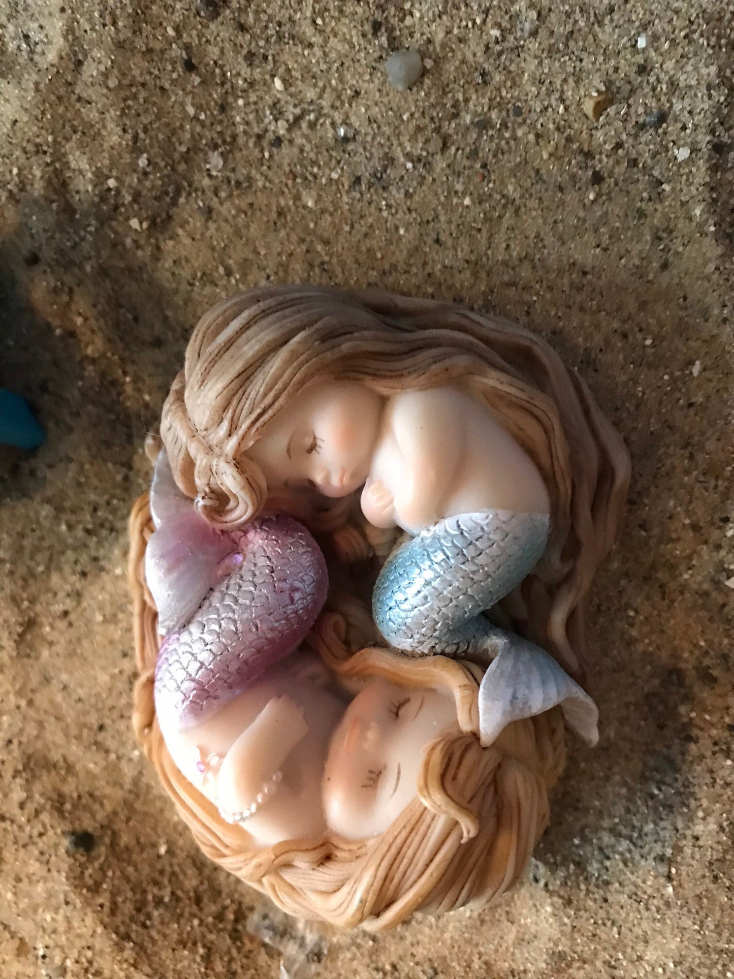 Beautiful sleeping mermaids wrapped sweetly in Sleep miniature coastal garden mermaid, miniature beach accessories