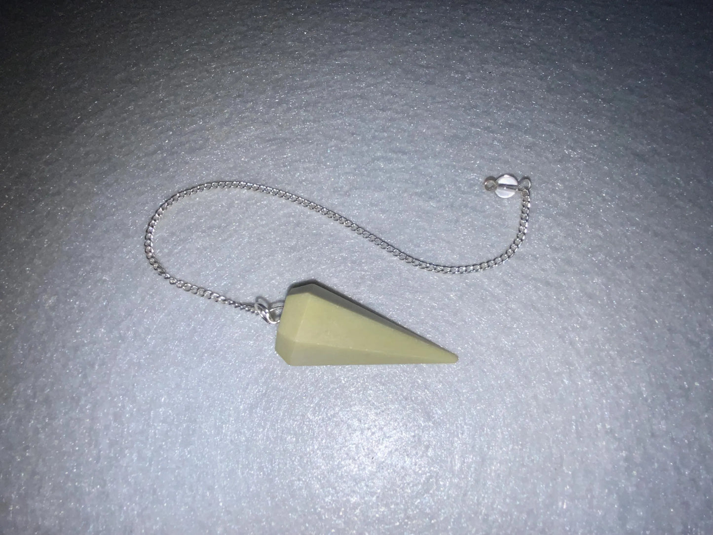 Beautiful Serpentine Pendulum is  1.75” and with chain is 9.25”