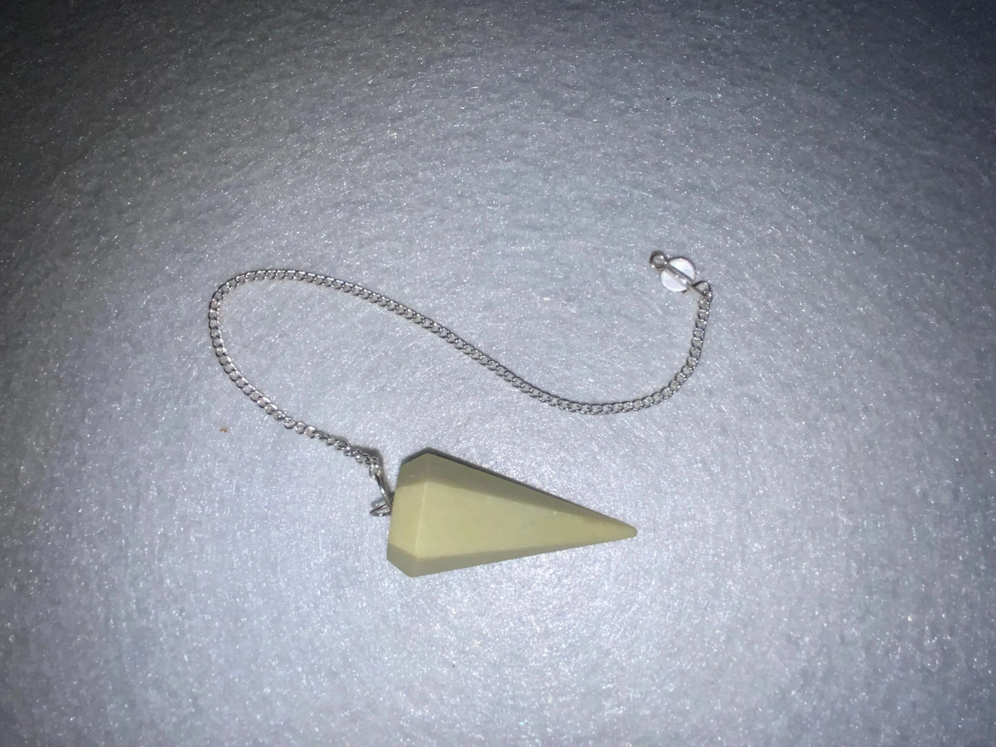 Beautiful Serpentine Pendulum is  1.75” and with chain is 9.25”