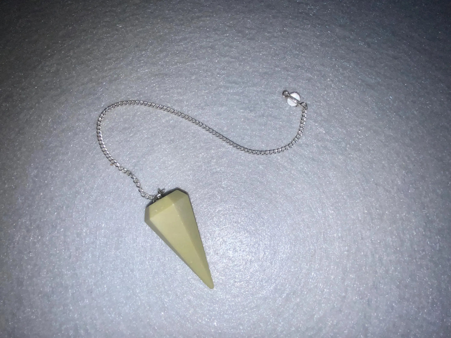 Beautiful Serpentine Pendulum is  1.75” and with chain is 9.25”