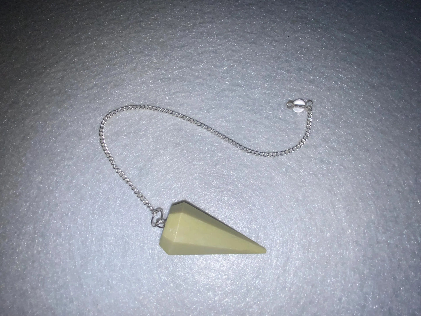 Beautiful Serpentine Pendulum is  1.75” and with chain is 9.25”
