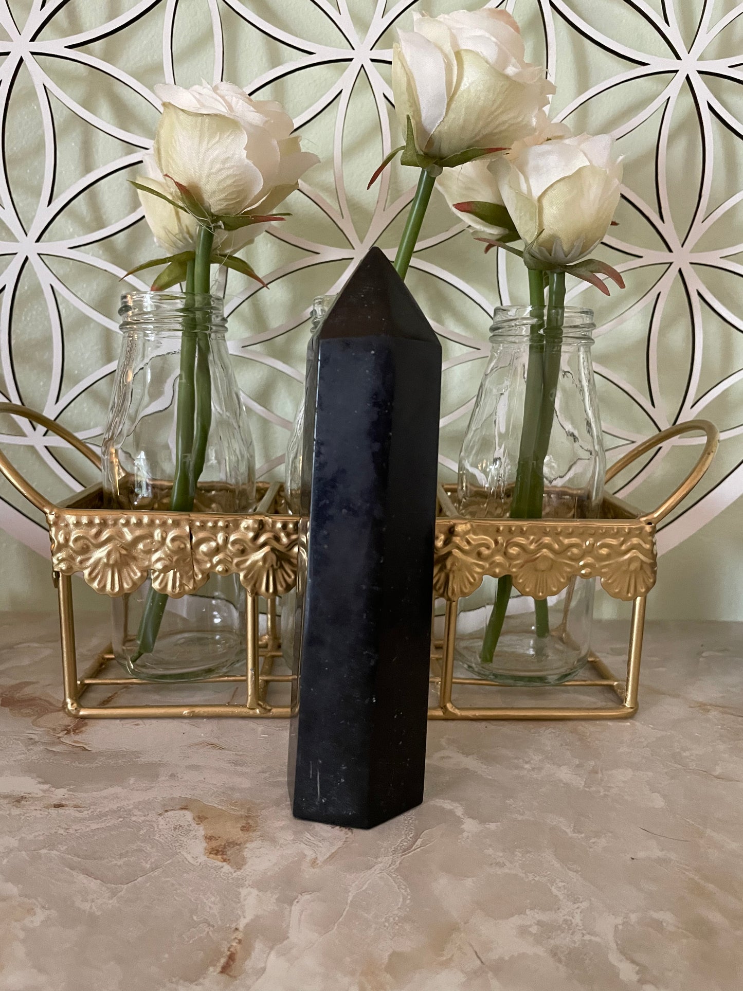 This magnificent Black Tourmaline point is approximately 6” tall and weighs 14.4 ounces.