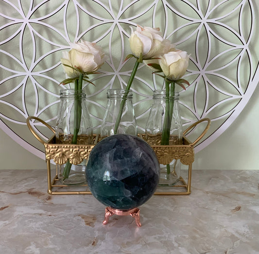 Rainbow Fluorite Sphere weighs over 2 pounds