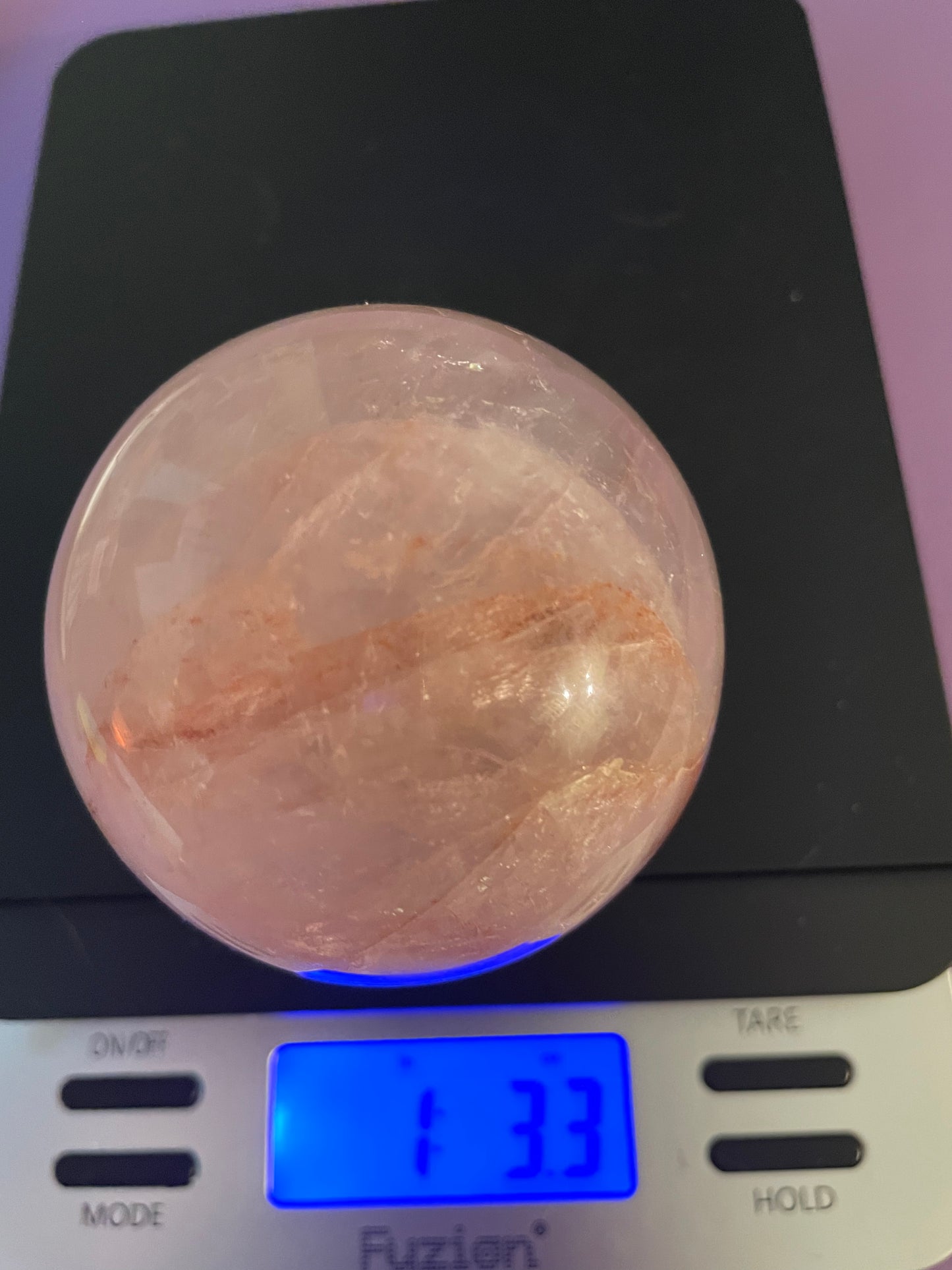 Fire Quartz Sphere weighs just over 1 pound