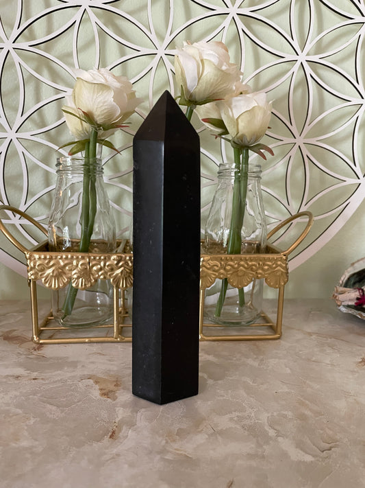 This magnificent Black Tourmaline point is approximately 7” tall and weighs 1 pound 1 ounces.