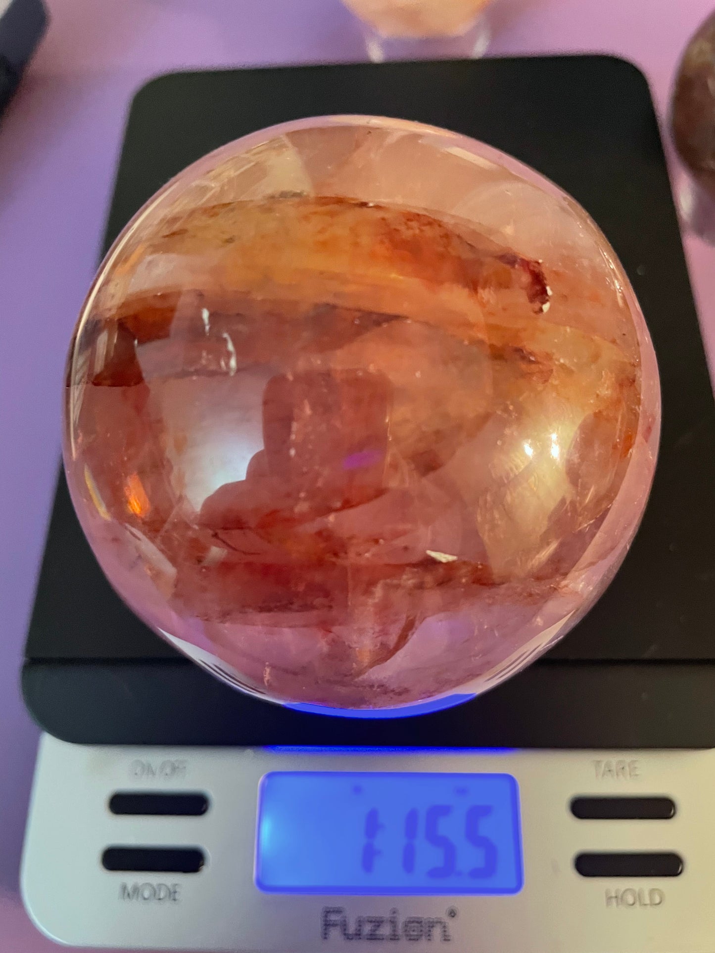 Beautiful specimen of Fire Quartz Sphere weighs just under 2 pound