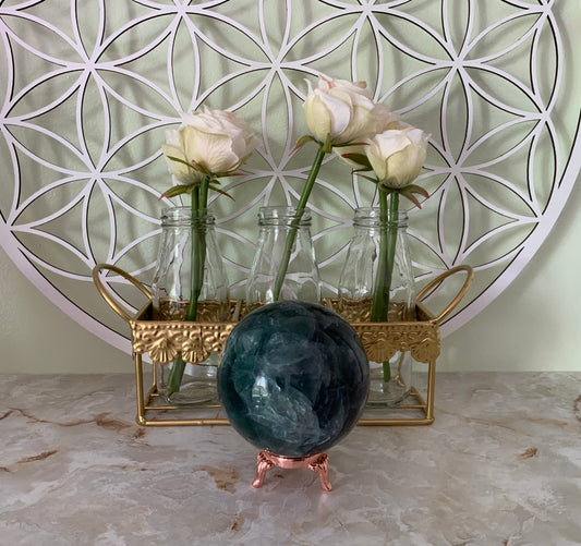 Rainbow Fluorite Sphere weighs over 2 pounds