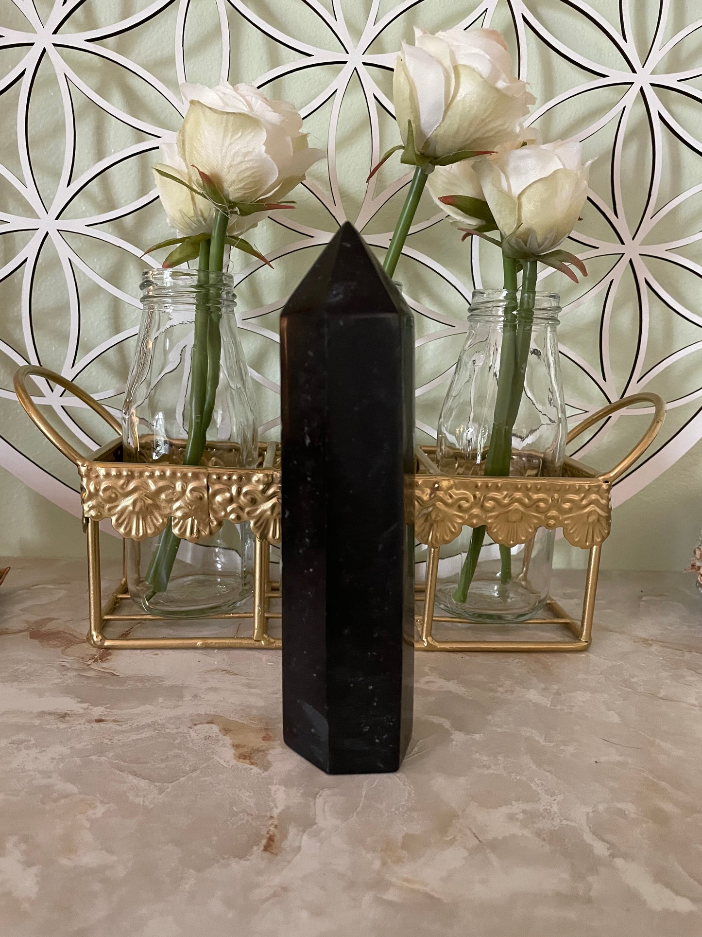 This magnificent Black Tourmaline point is approximately 6” tall and weighs 14.4 ounces.