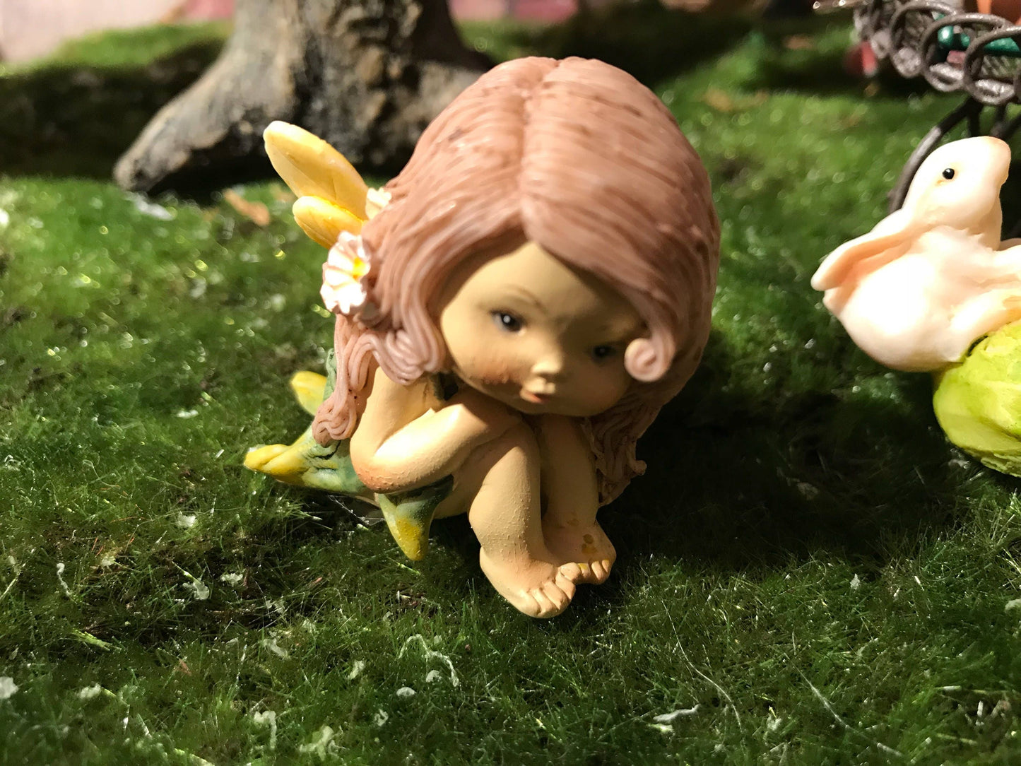 Little fairy with sweet face in deep wonder