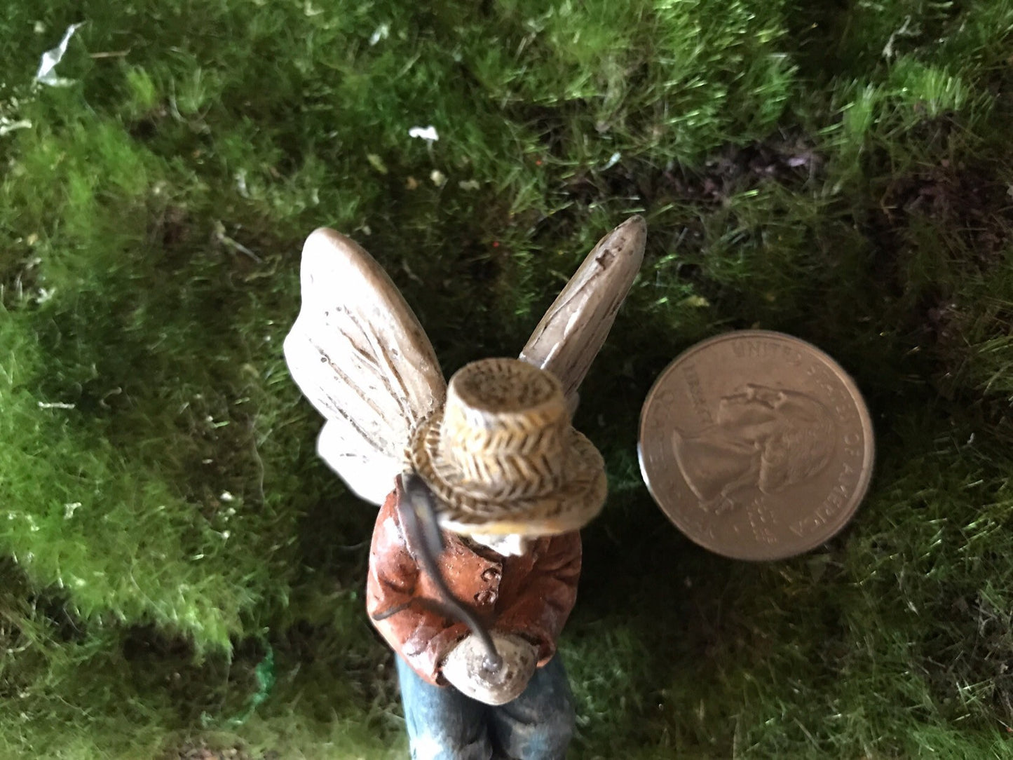 Fairy boy figurine with fishing pole
