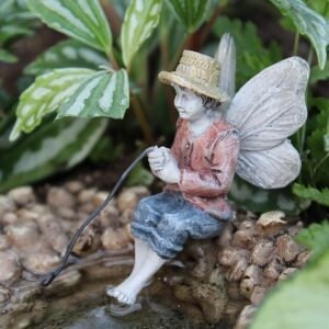 Fairy boy figurine with fishing pole
