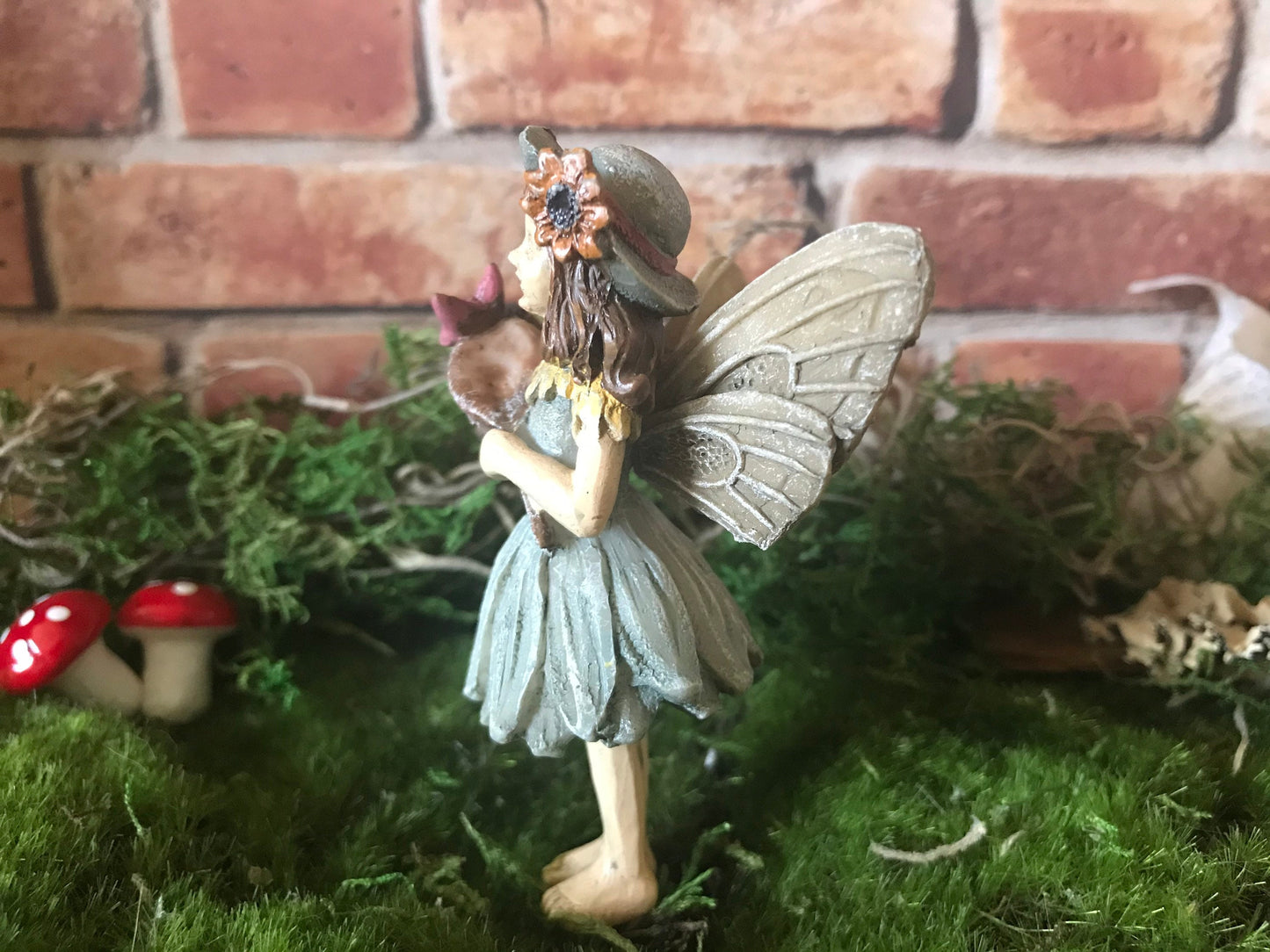 Sweet fairy girl with butterfly and butterfly net