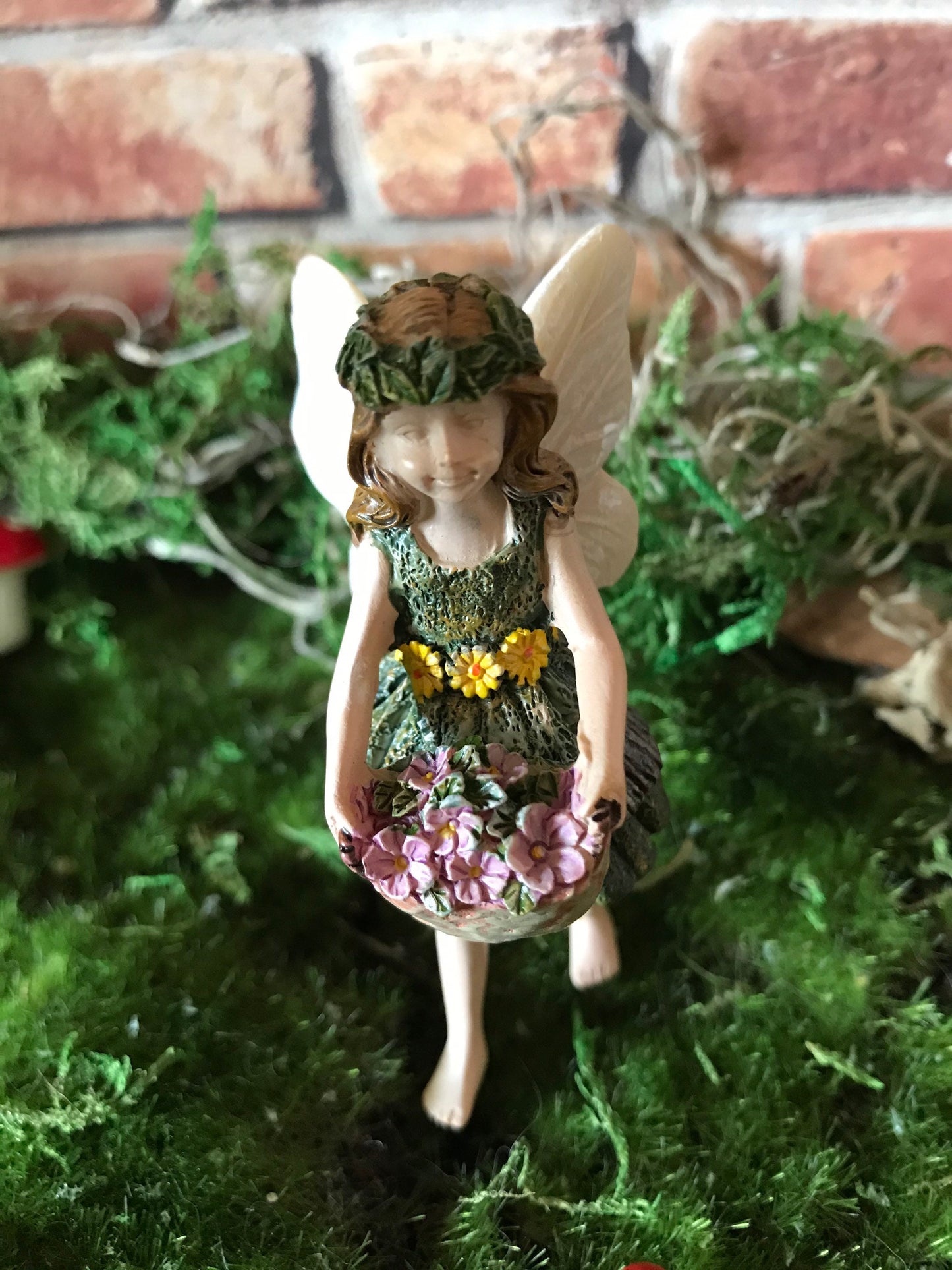 Sweet fairy girl with flowers