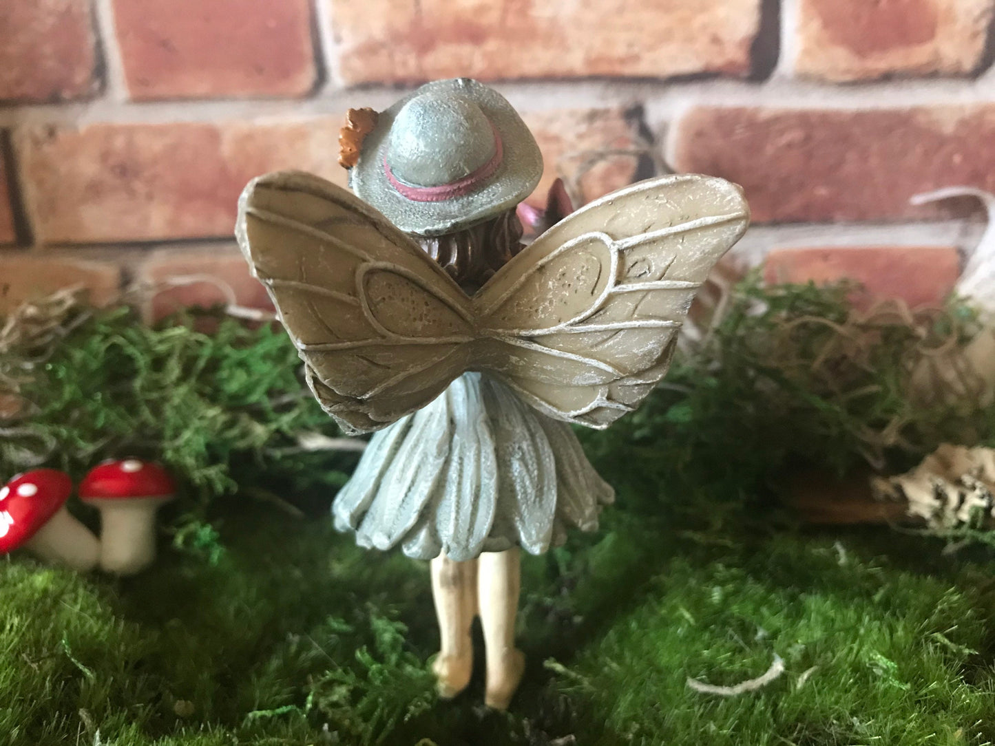 Sweet fairy girl with butterfly and butterfly net