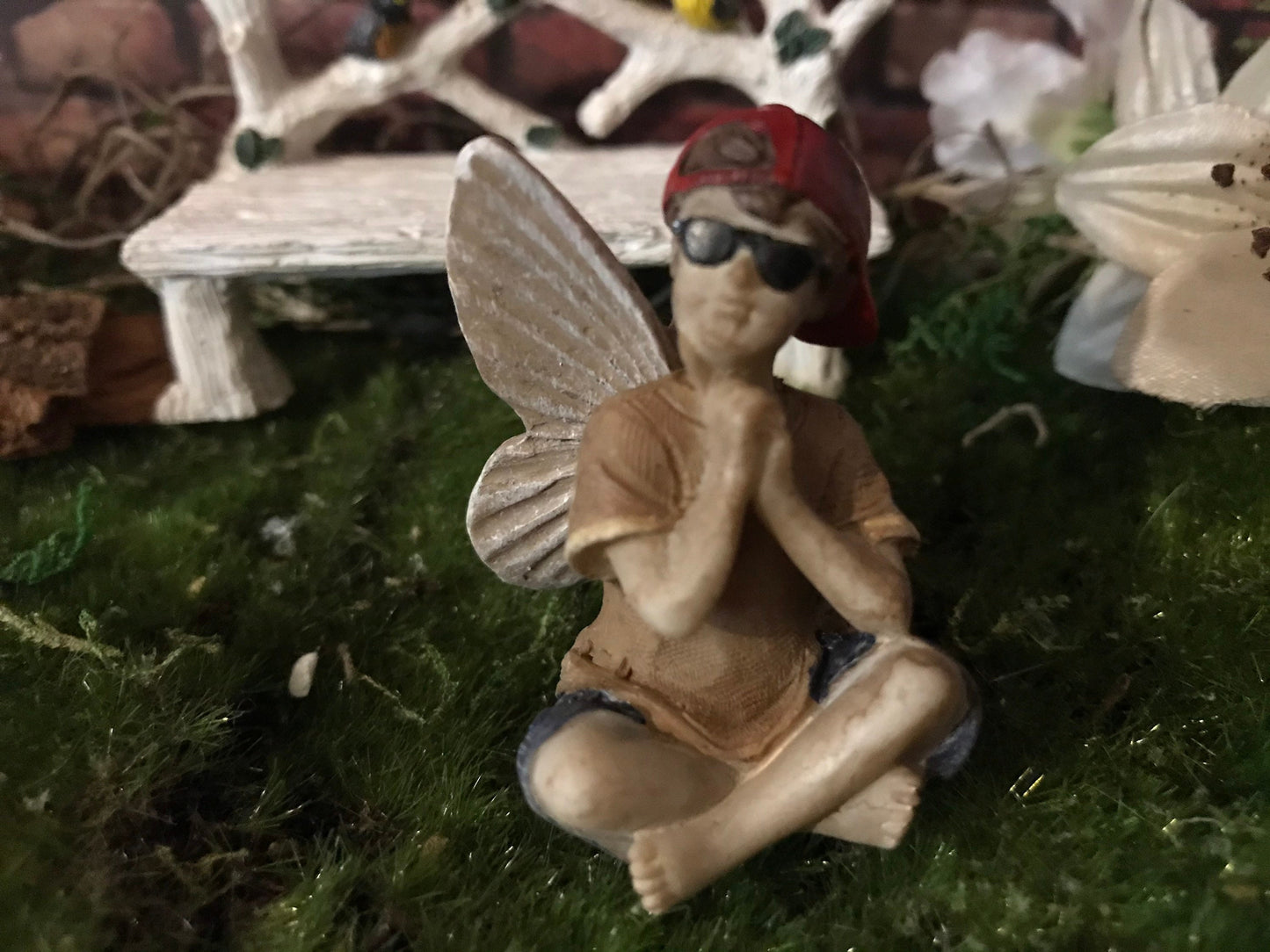 Fairy Boy wearing sunglasses and baseball cap