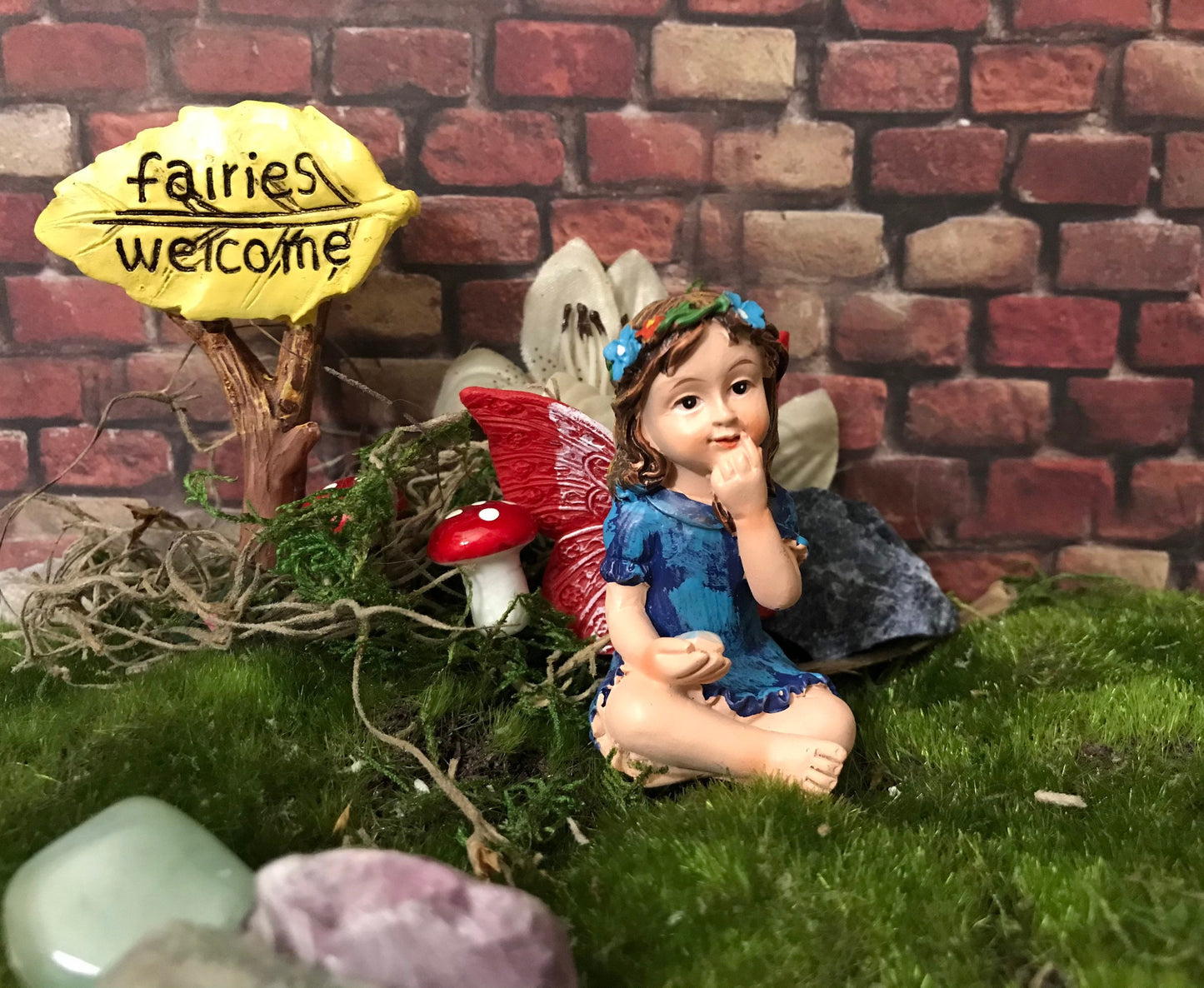 Just look at these sweet faces! Set of 4 miniature fairy garden fairy holding a cute gem