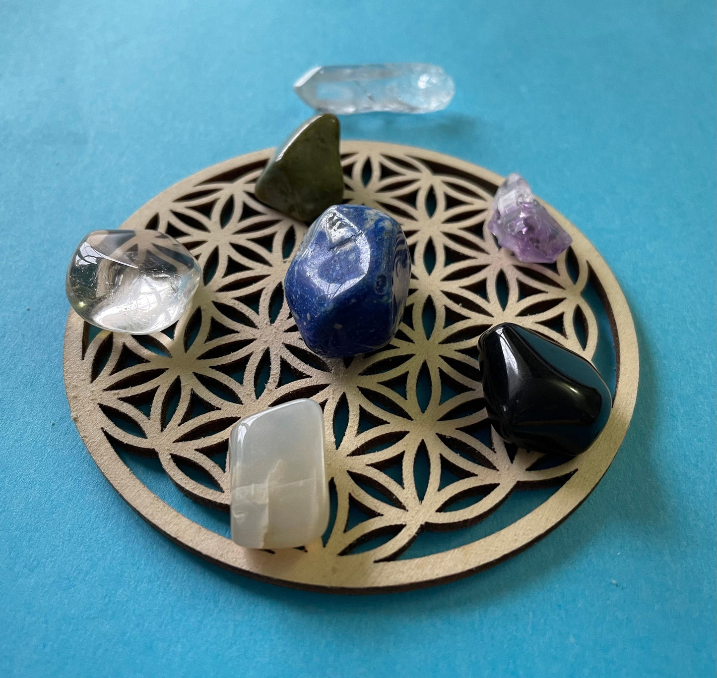 8 piece psychic empowerment healing crystal set with flower of life grid perfect for stocking stuffers