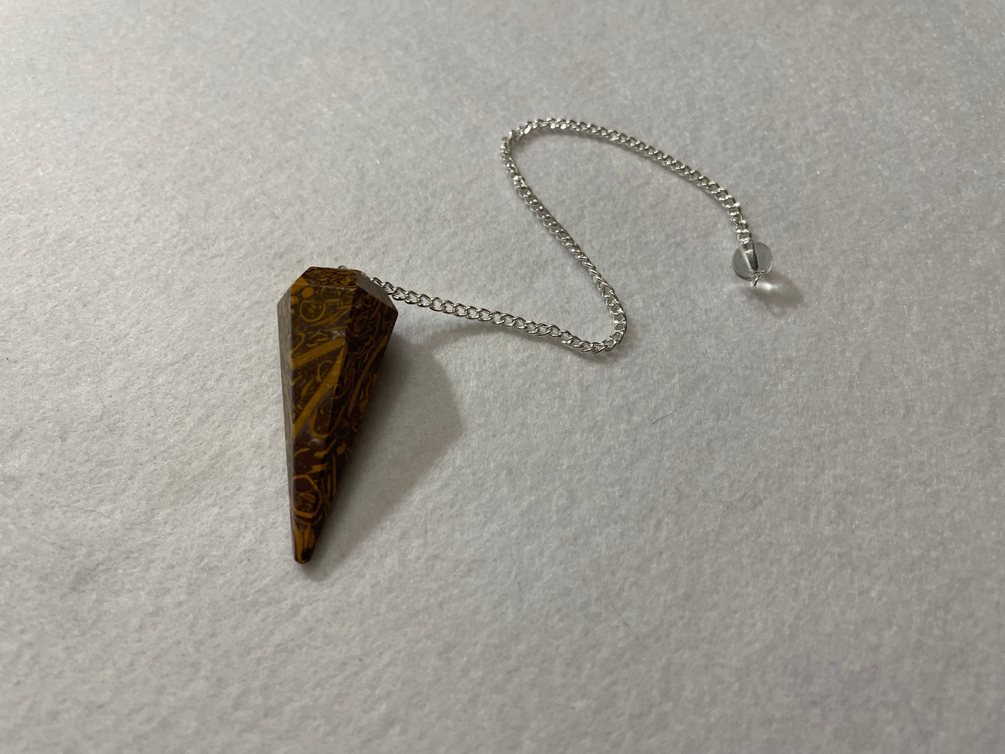 This Mariam Jasper Pendulum is  1.75” with chain is 8.5”.