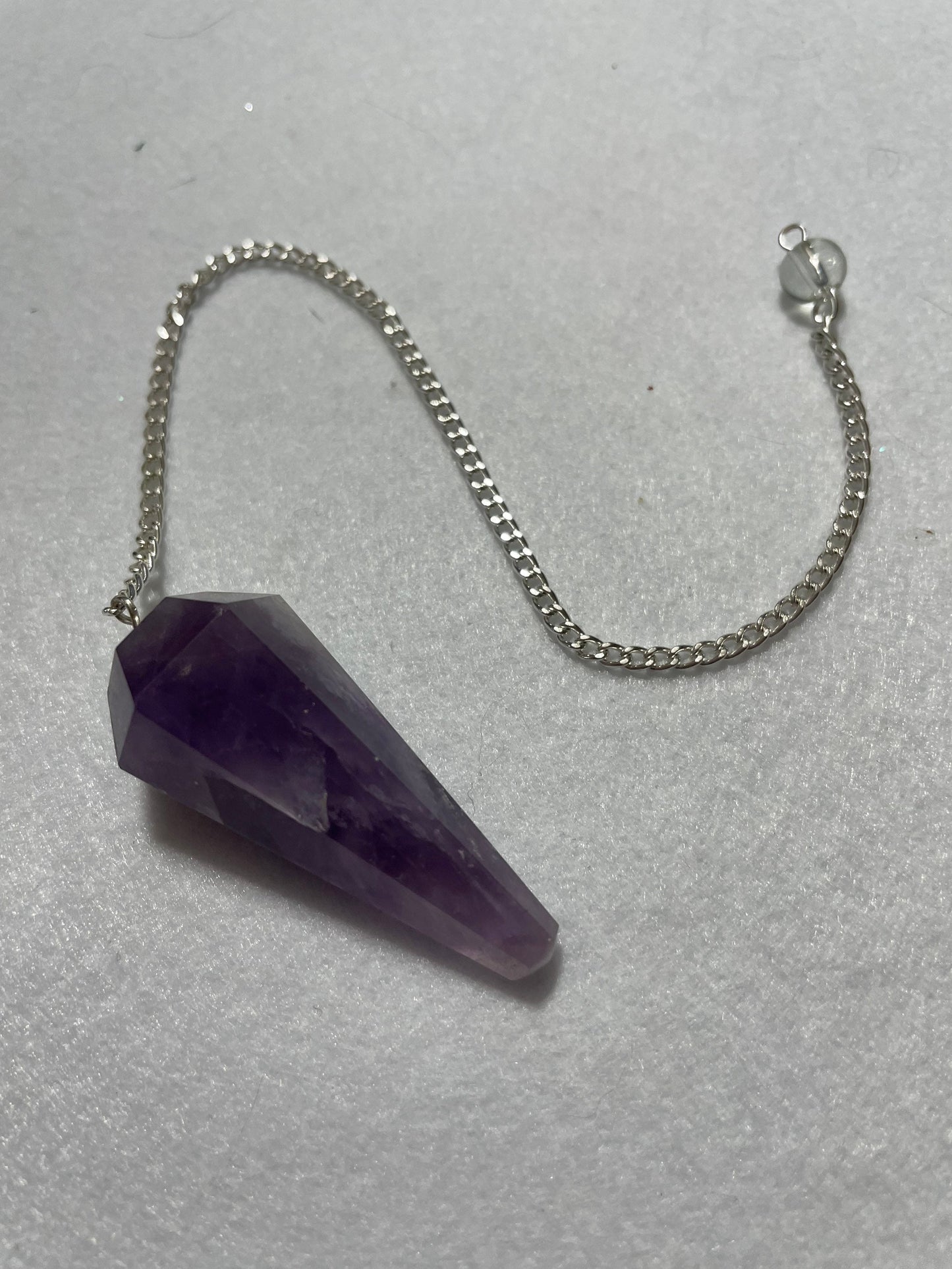 Perfect Amethyst Pendulum is  1.75” and with chain is 9.5”