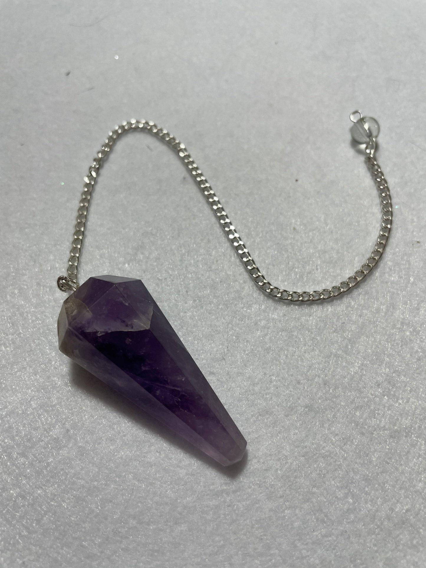 Perfect Amethyst Pendulum is  1.75” and with chain is 9.5”