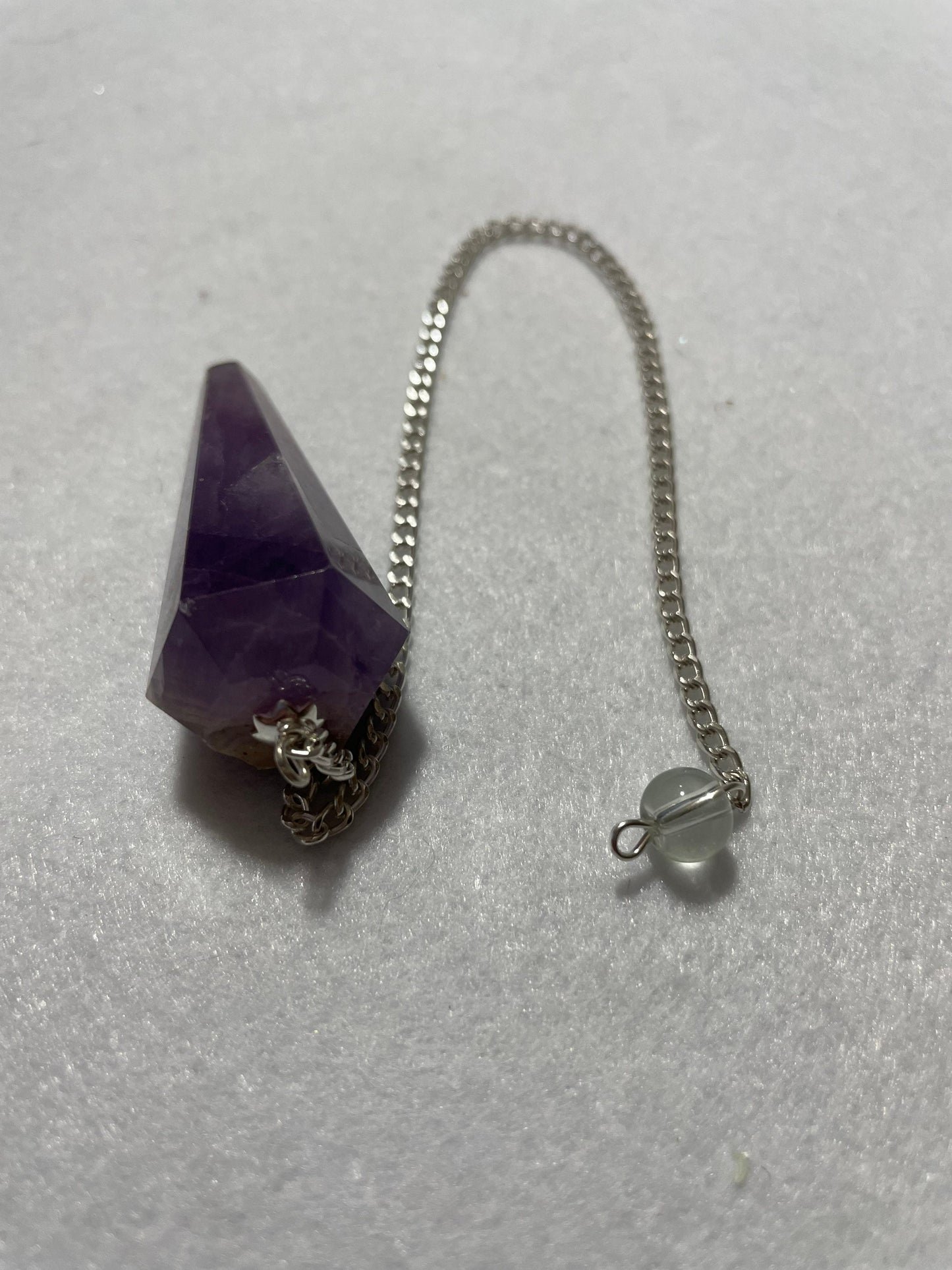 Perfect Amethyst Pendulum is  1.75” and with chain is 9.5”