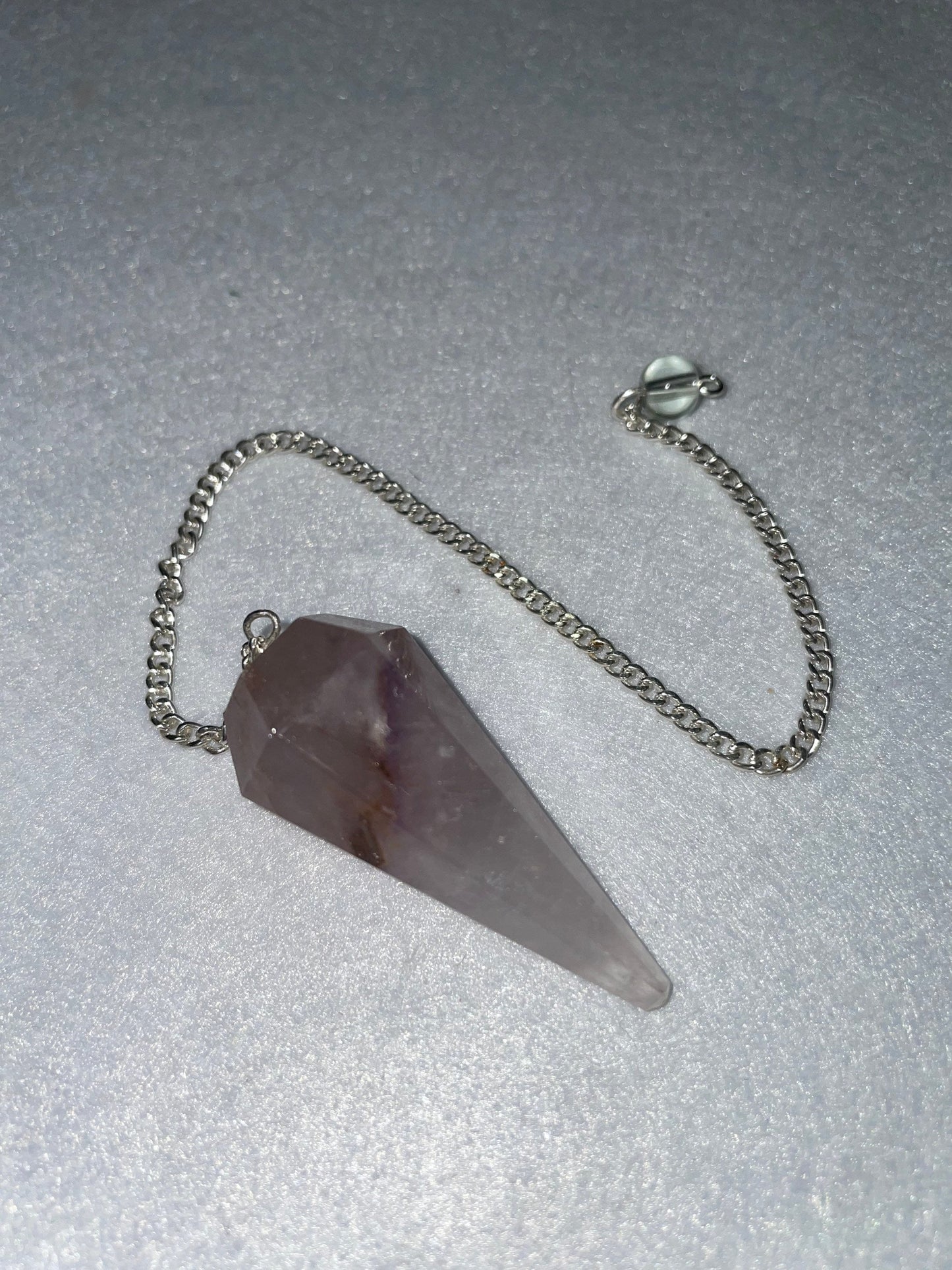 Amethyst Pendulum is  1.75” and with chain is 8.75”
