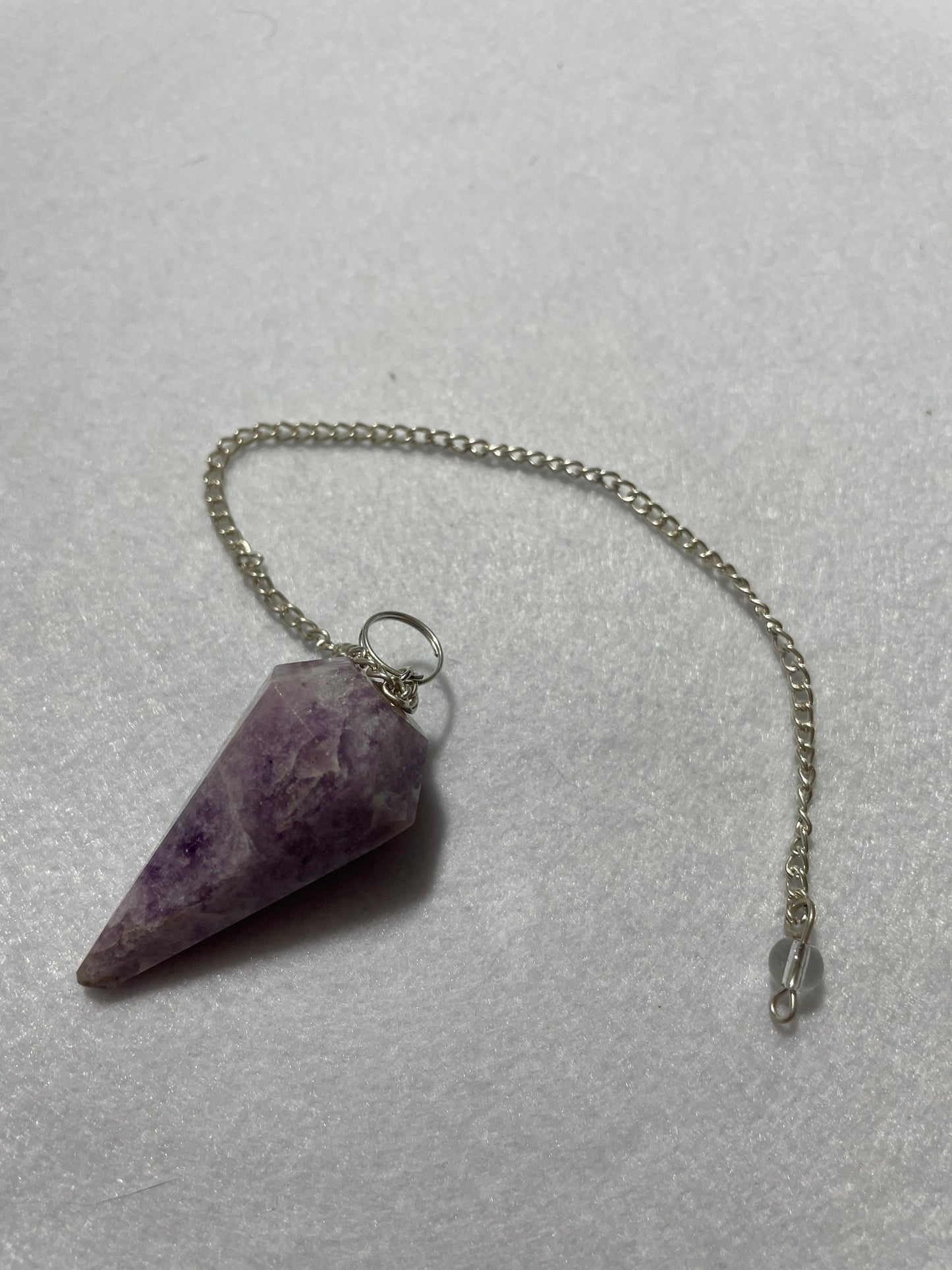 Healing Lepidolite Pendulum is  1.75” and with chain is 9”