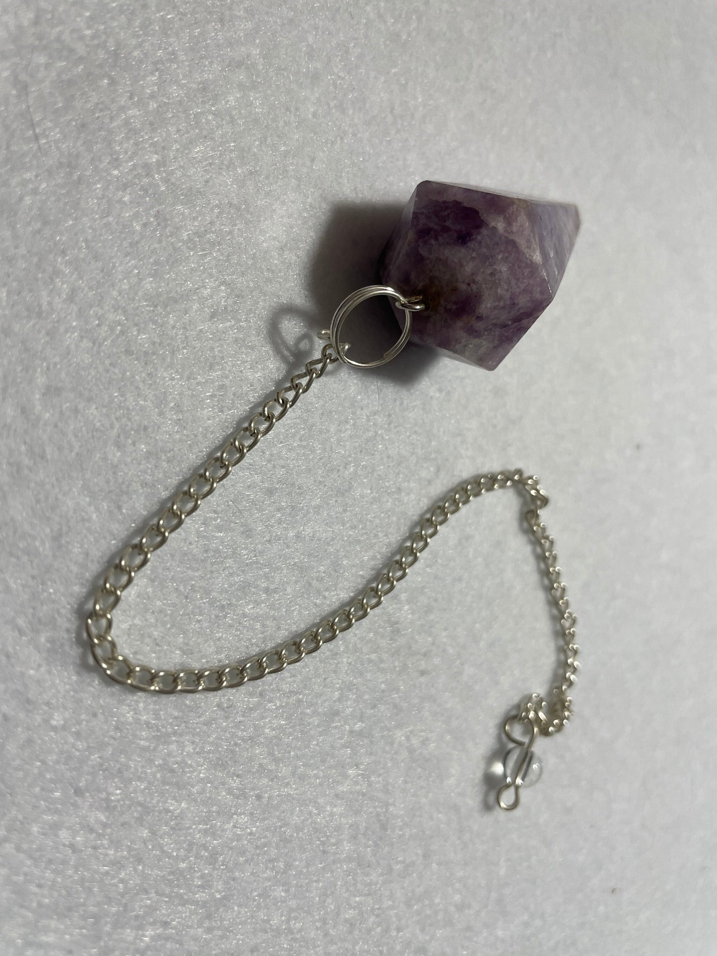 Healing Lepidolite Pendulum is  1.75” and with chain is 9”