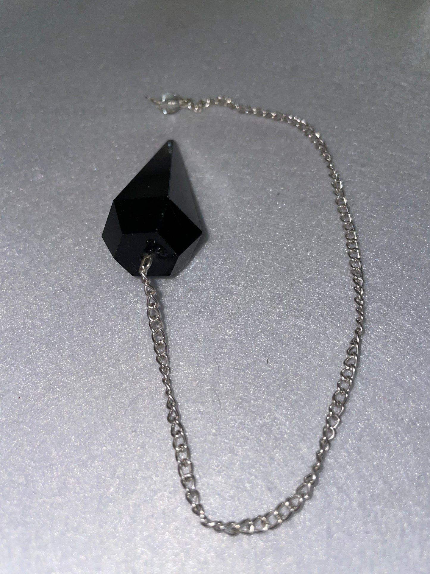 Black Obsidian Pendulum is  1.65” and with chain is 9”