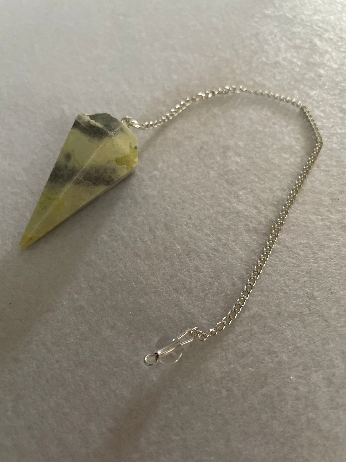 Beautiful Serpentine Pendulum is  1.85” and with chain is 8.5”