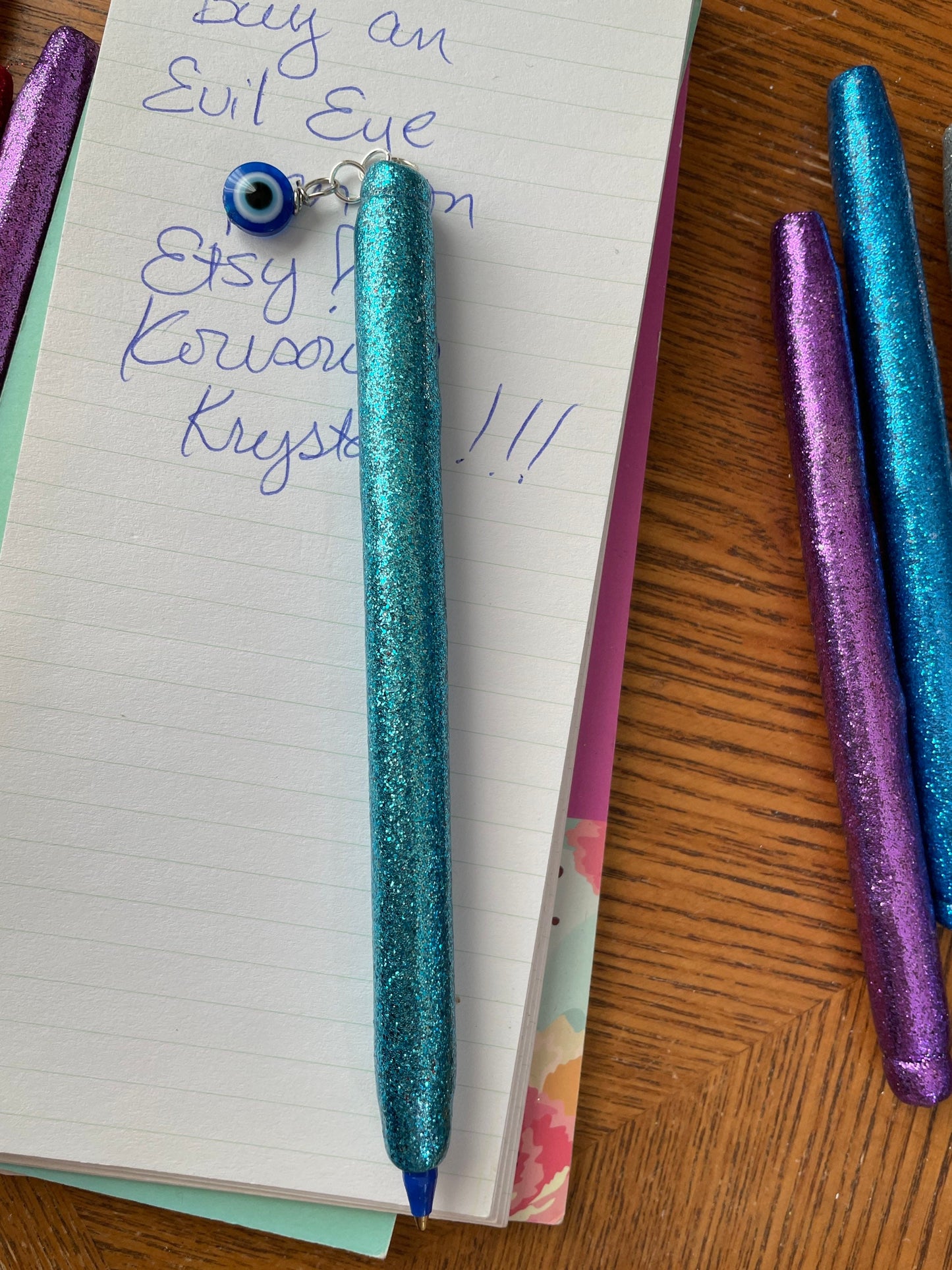 Evil Eye refillable glitter pens!
