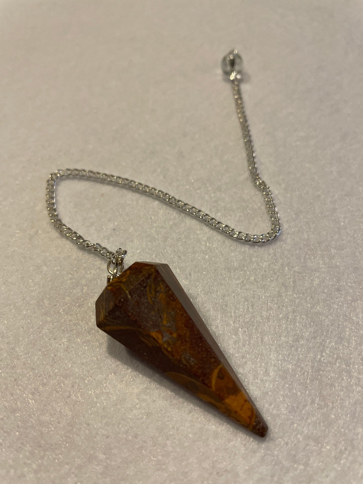 Awesome Yellow Jasper Pendulum is 1.50” with chain approximately 8.25”
