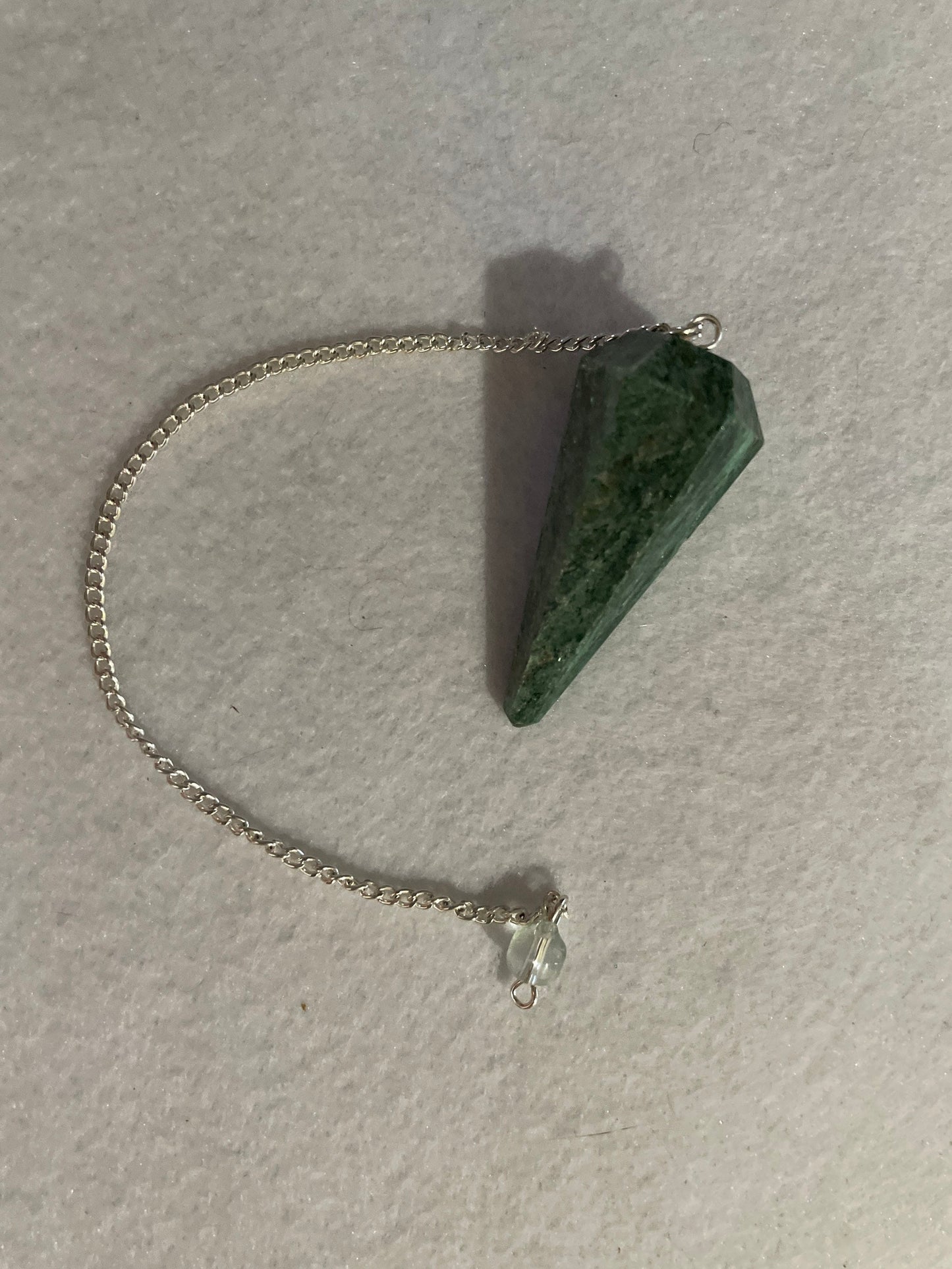 Pretty Jade Pendulum is  1.75” and with chain is 8.5”