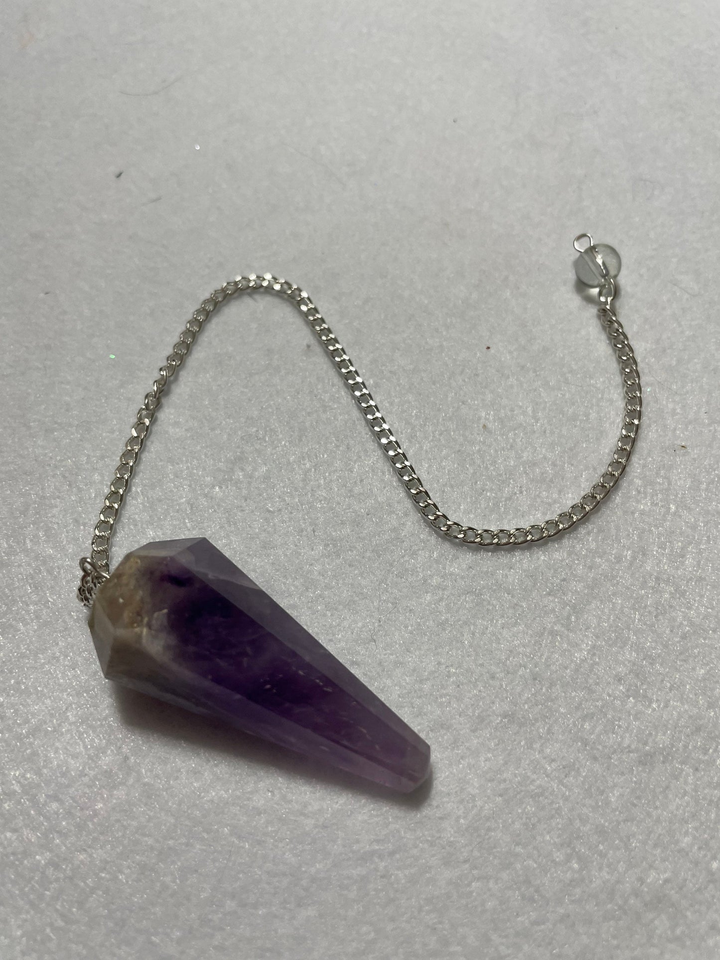 Perfect Amethyst Pendulum is  1.75” and with chain is 9.5”