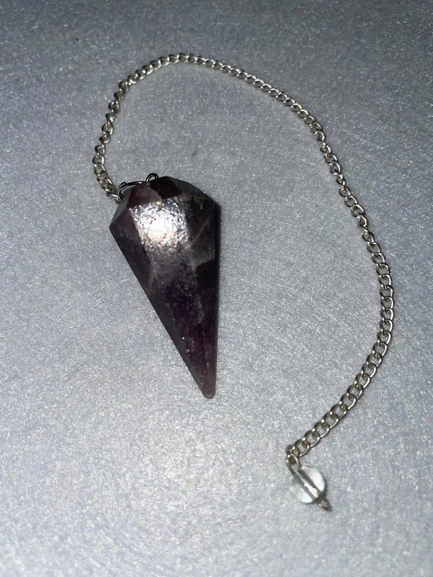 Lovely healing Amethyst Pendulum is  1.65” and with chain is 9.5”.