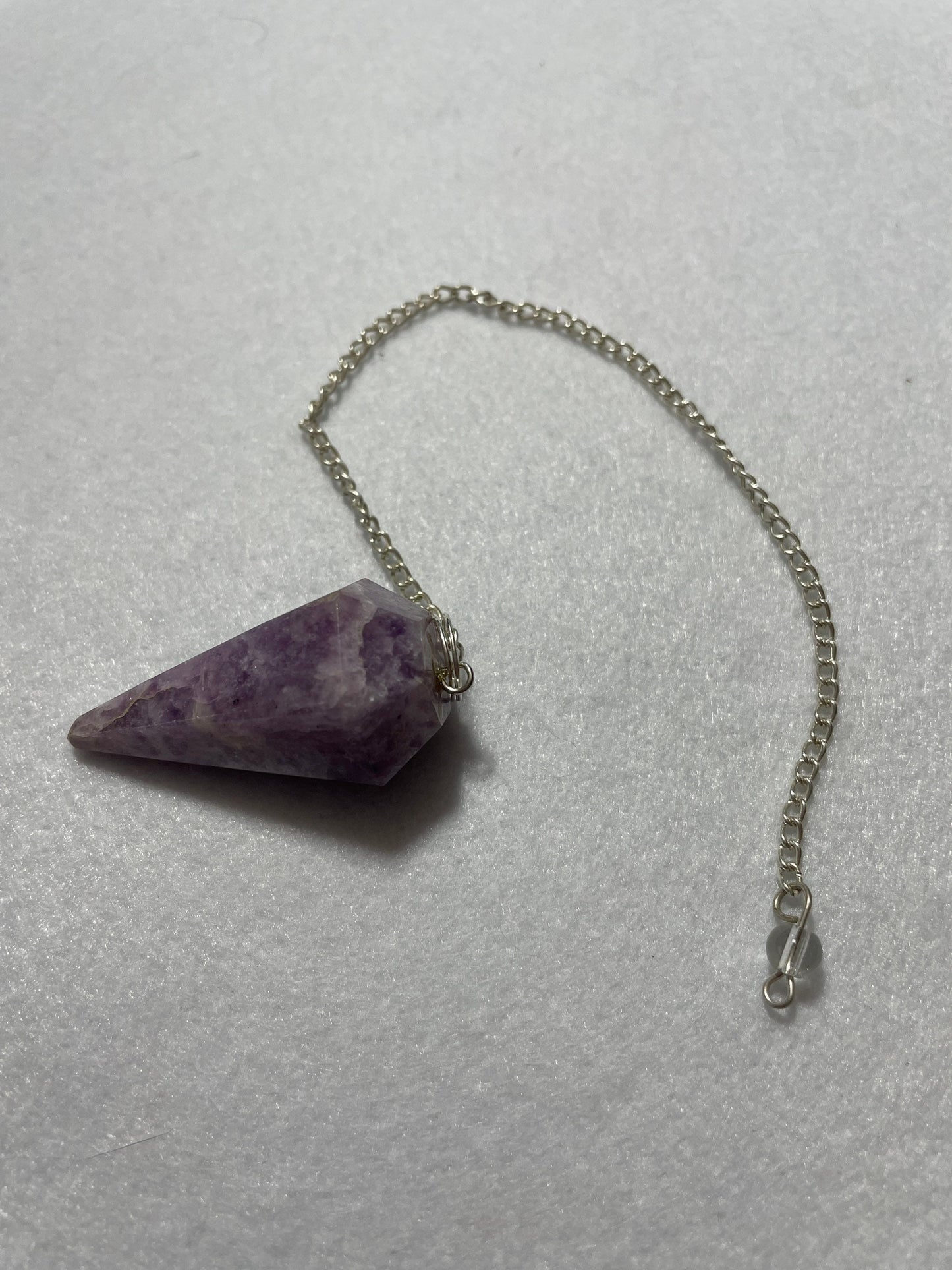 Healing Lepidolite Pendulum is  1.75” and with chain is 9”