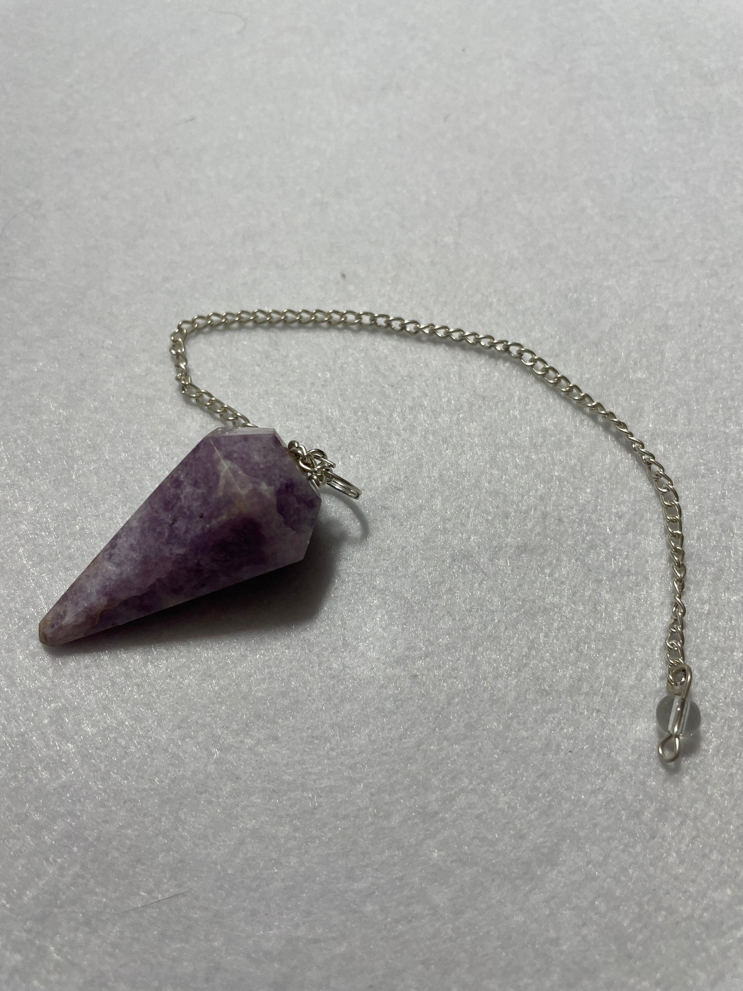 Healing Lepidolite Pendulum is  1.75” and with chain is 9”