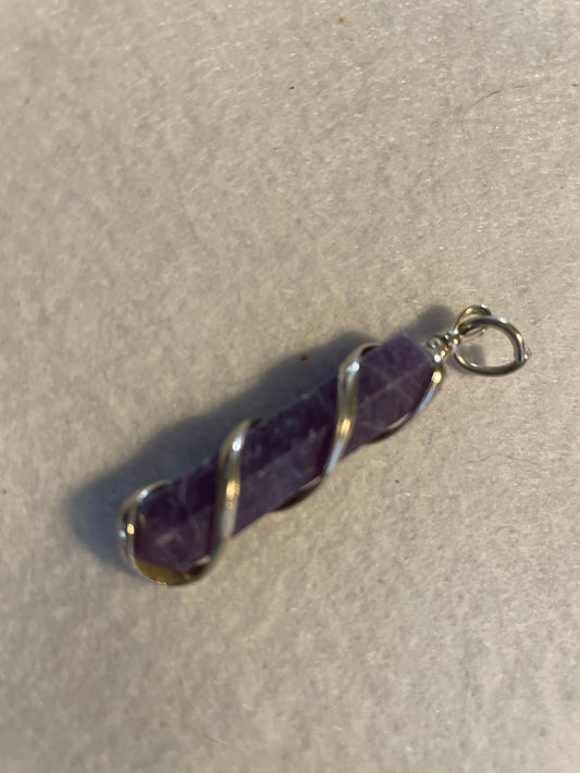Gorgeous Amethyst Point Pendant is  1.50” and is wrapped in precious silver