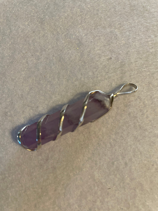 Gorgeous Amethyst Point Pendant is  1.5” and is wrapped in precious silver