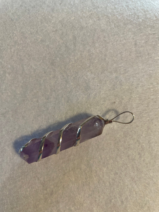 Gorgeous Amethyst Point Pendant is  1.5” and is wrapped in precious silver